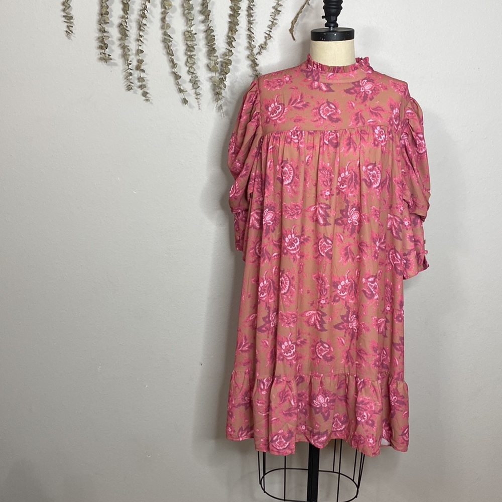 Boohoo Pink Floral Mini Dress on Tan Background